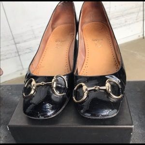Gucci black patent low heeled flats